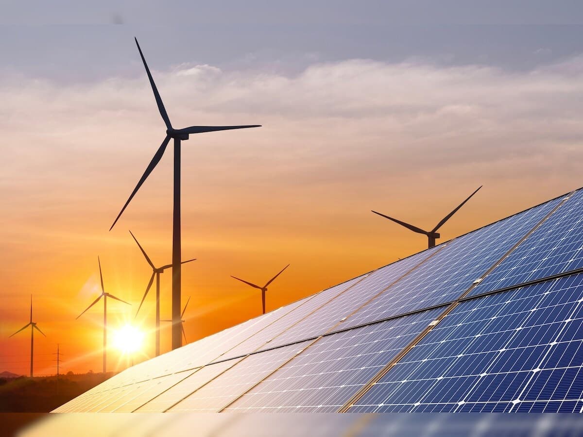 Wind turbines at sunrise representing clean energy projects